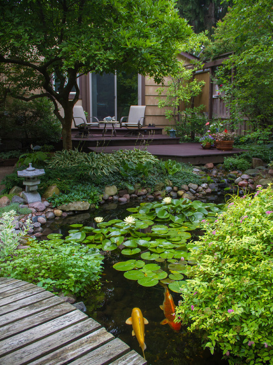 這一張庭院假山魚池設(shè)計(jì)中圖片造型生動(dòng),錯(cuò)落有致的假山造景